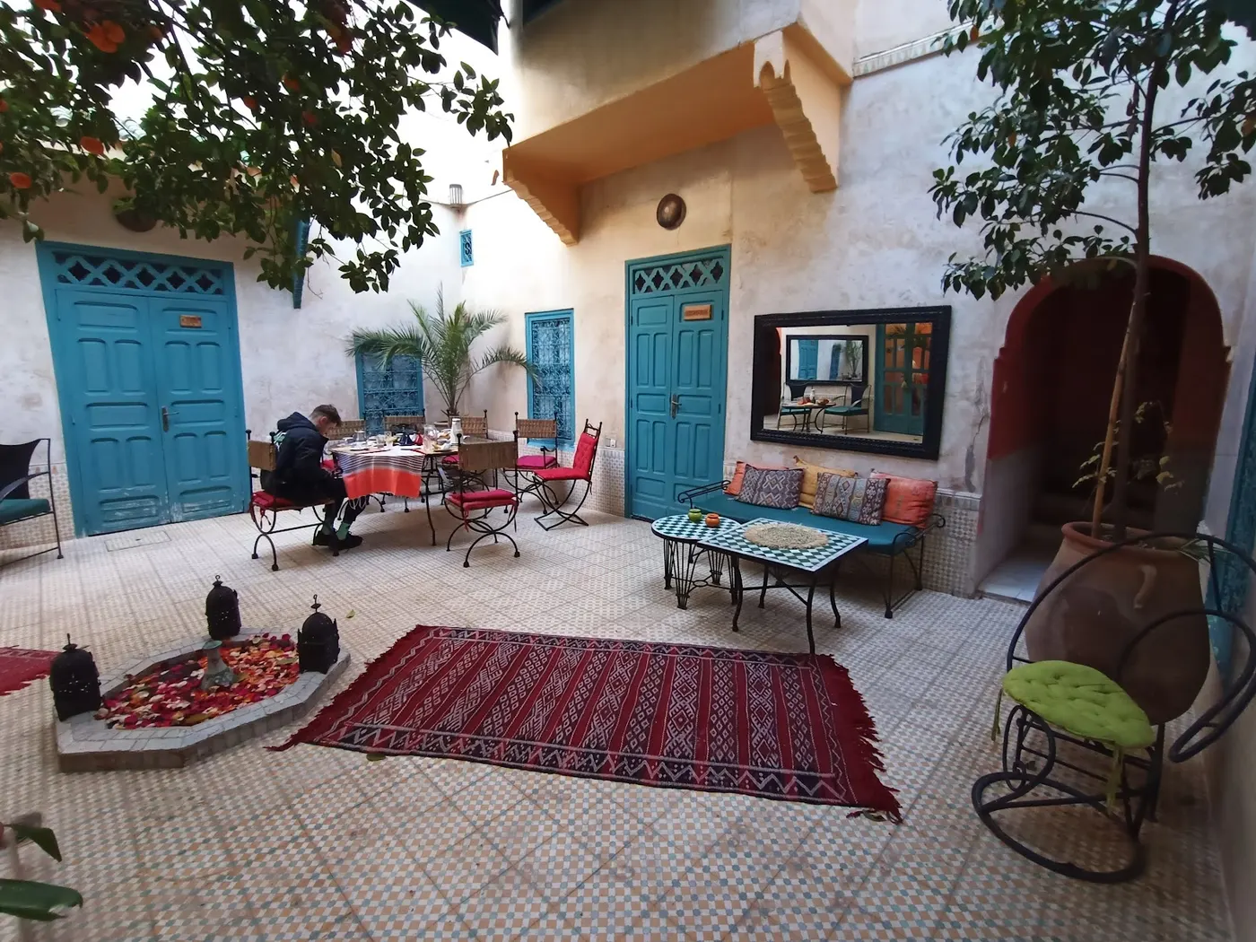Berber rugs and benches on the terrace